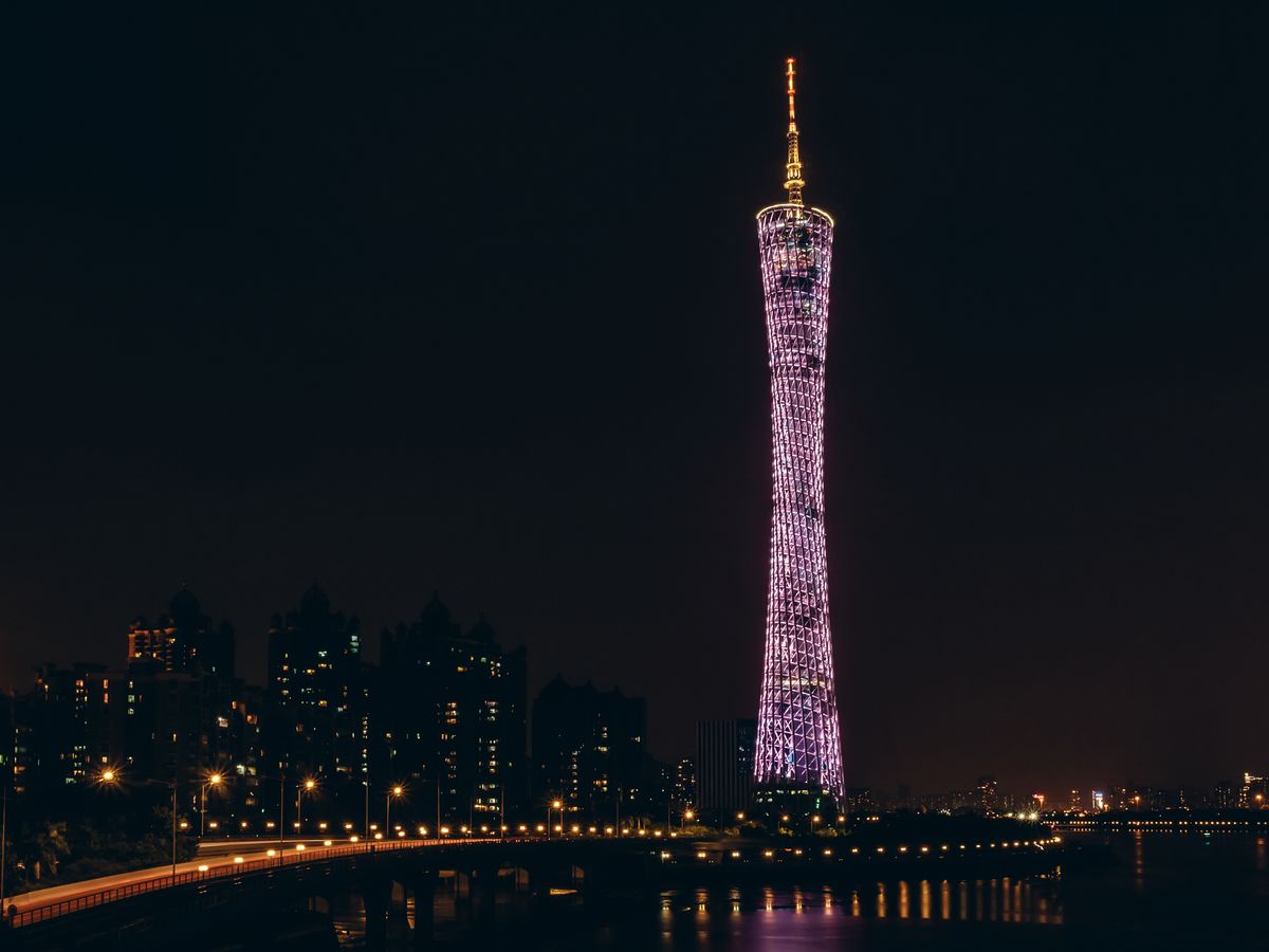 Breathtaking view of Canton Tower glowing against the night sky in Guangzhou, China.