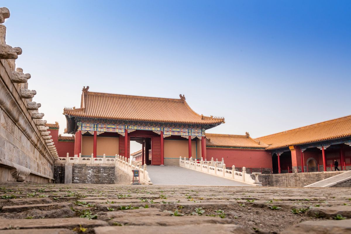 Explore the ancient architecture of the Forbidden City in this vibrant image.