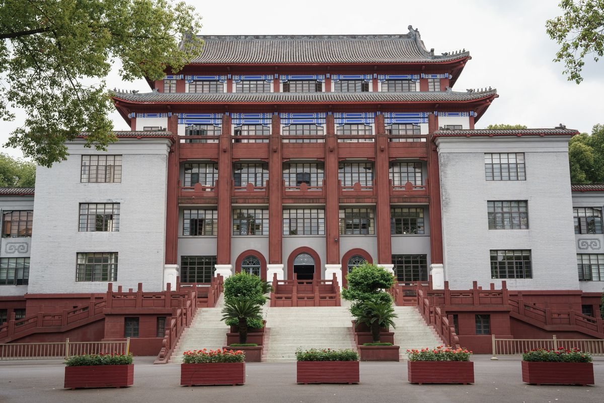 Front view of a traditional building at Sichuan University in Chengdu, showcasing distinct architectural features.
